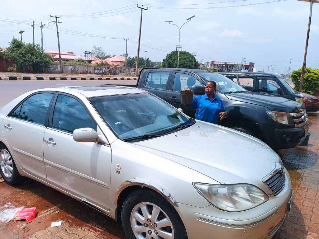 Female Graduate Turns  Commercial Car Washer, Recounts Difficulties In Awka